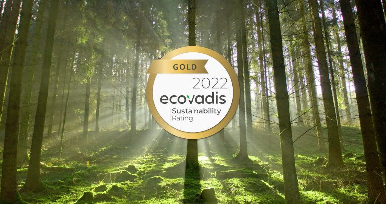 Merssen Gold EcoVadis medal on a forest background
