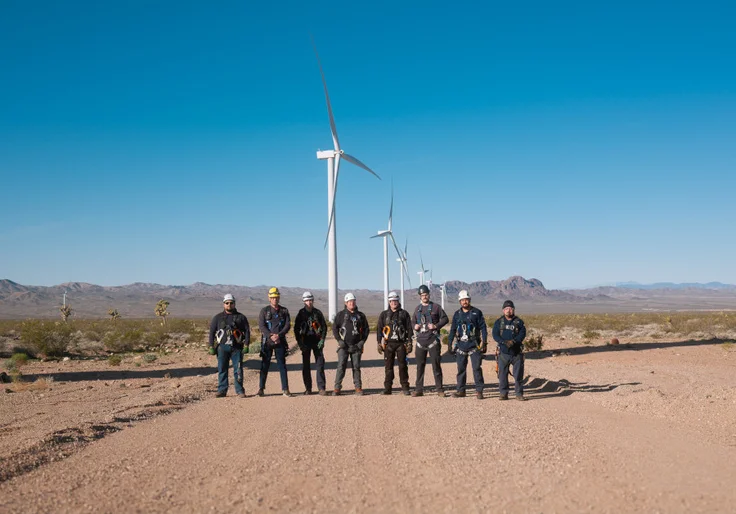 Mersen wind generator maintenance team in a wind farm field