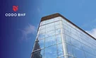 ODDO BHF logo on a sky background with a glass building